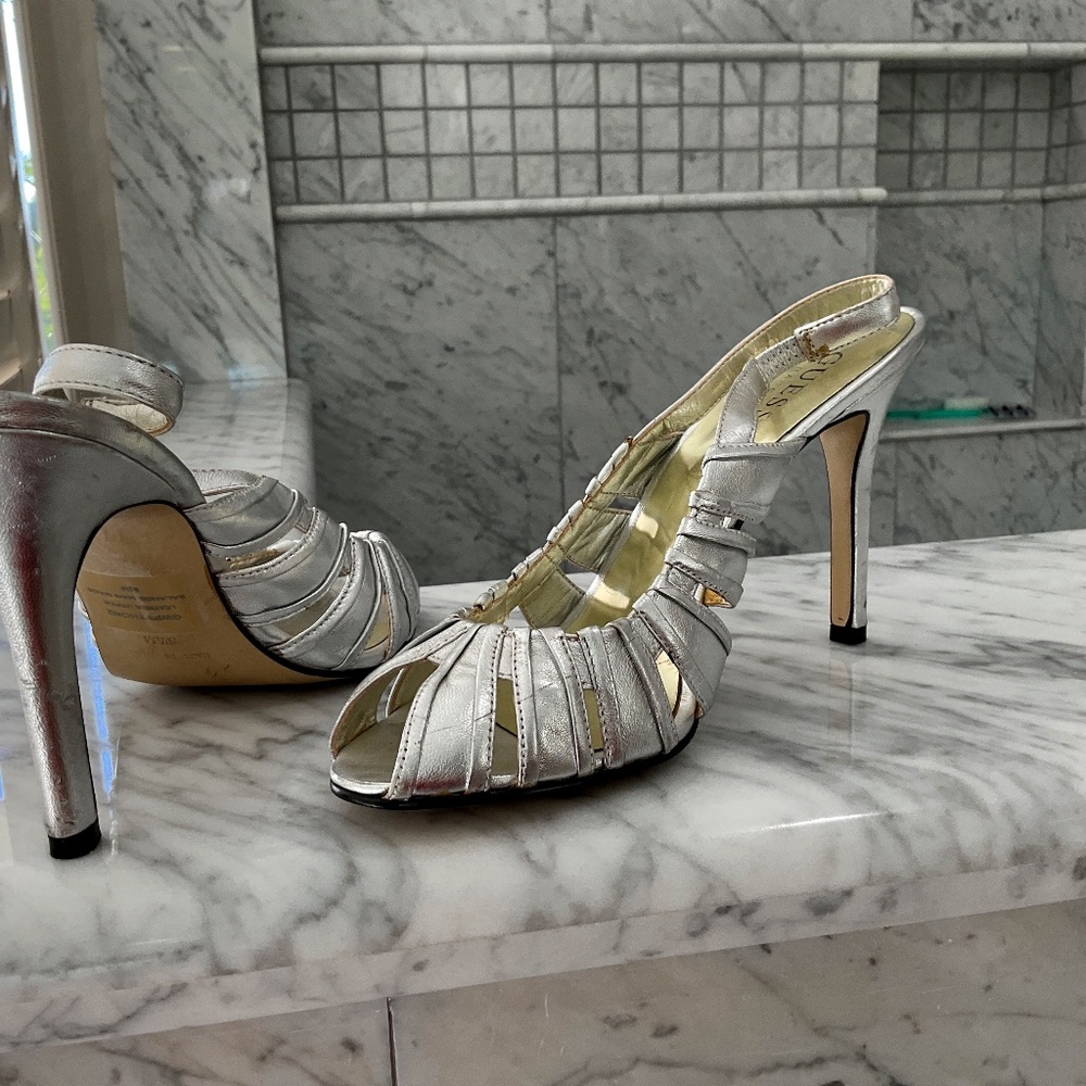 Open-toe metallic silver women’s heels